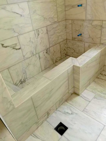 Carrara marble bathroom tiling
